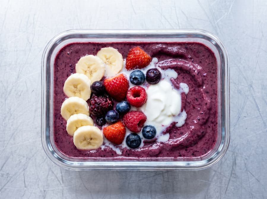 Berry Smoothie Bowl topped with fresh berries, granola and seeds